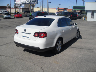 volkswagen jetta 2009 white sedan gasoline 5 cylinders front wheel drive automatic 79925