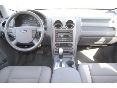 ford freestyle 2005 white suv sel gasoline 6 cylinders front wheel drive automatic 77504