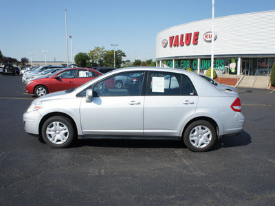 nissan versa 2011 silver sedan gasoline 4 cylinders front wheel drive automatic 19153