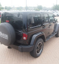 jeep wrangler unlimited 2012 black suv sahara gasoline 6 cylinders 4 wheel drive 6 speed manual 76051