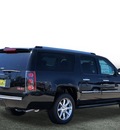 gmc yukon xl 2012 carbon blk met suv flex fuel 8 cylinders 2 wheel drive automatic 77094