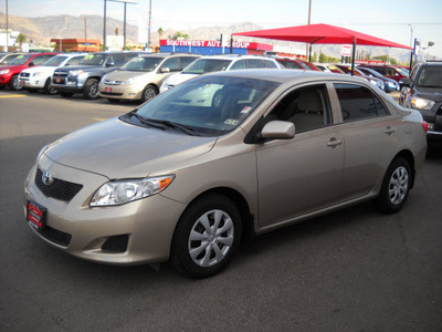 toyota corolla 2010 gold sedan gasoline 4 cylinders front wheel drive automatic 79925