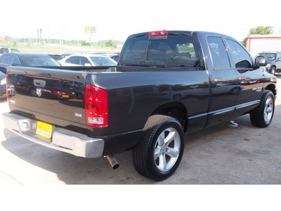 dodge ram pickup 1500 2006 black pickup truck slt gasoline 8 cylinders rear wheel drive automatic with overdrive 77340