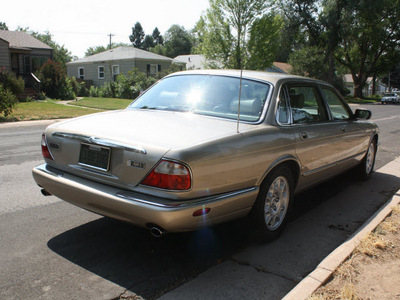 jaguar xj series 1998 gold sedan xj8l gasoline v8 rear wheel drive automatic 80110