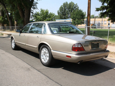 jaguar xj series 1998 gold sedan xj8l gasoline v8 rear wheel drive automatic 80110