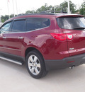 chevrolet traverse 2010 red suv ltz gasoline 6 cylinders front wheel drive automatic 77304
