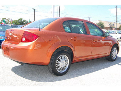 chevrolet cobalt 2007 orange sedan ls gasoline 4 cylinders front wheel drive automatic 77020