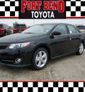 toyota camry 2012 black sedan se gasoline 4 cylinders front wheel drive automatic 77469