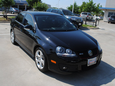 volkswagen gli 2009 black sedan gasoline 4 cylinders front wheel drive 6 speed manual 75034