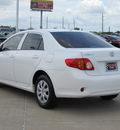 toyota corolla 2010 white sedan le gasoline 4 cylinders front wheel drive automatic with overdrive 77469