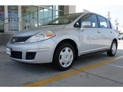nissan versa 2009 silver hatchback gasoline 4 cylinders front wheel drive automatic 77521