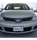 nissan versa 2009 silver hatchback gasoline 4 cylinders front wheel drive automatic 77521