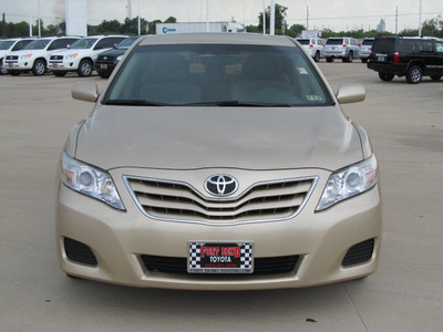 toyota camry 2010 tan sedan le gasoline 4 cylinders front wheel drive automatic with overdrive 77469