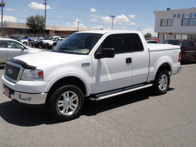 ford f 150 2004 white gasoline 8 cylinders 4 wheel drive automatic 79936