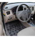 kia rio 2011 beige sedan lx gasoline 4 cylinders front wheel drive automatic 78861