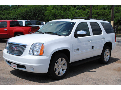 gmc yukon 2012 white suv slt flex fuel 8 cylinders 2 wheel drive automatic with overdrive 77074