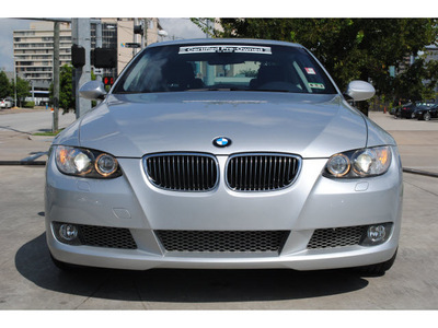 bmw 335i 2009 gray coupe gasoline 6 cylinders rear wheel drive automatic 77002