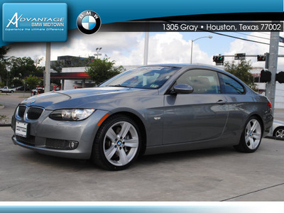 bmw 335i 2009 dk  gray coupe gasoline 6 cylinders rear wheel drive automatic 77002