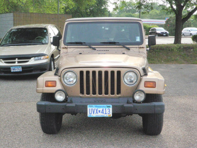 jeep wrangler 1999 lt  brown suv sahara gasoline 6 cylinders 4 wheel drive 5 speed manual 55318