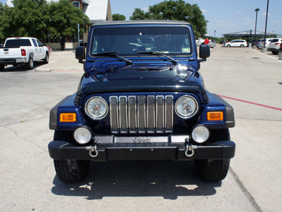 jeep wrangler 2006 blue suv unlimited gasoline 6 cylinders 4 wheel drive 6 speed manual 76087