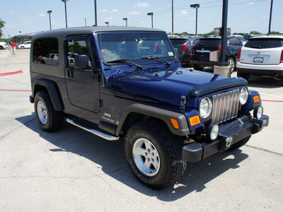 jeep wrangler 2006 blue suv unlimited gasoline 6 cylinders 4 wheel drive 6 speed manual 76087