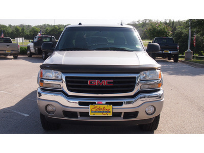 gmc sierra 1500 2005 silver slt gasoline 8 cylinders 4 wheel drive automatic with overdrive 77802