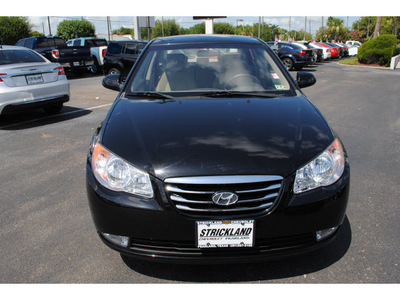 hyundai elantra 2010 black sedan gasoline 4 cylinders front wheel drive automatic with overdrive 77581