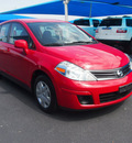 nissan versa 2011 red hatchback 1 8 gasoline 4 cylinders front wheel drive automatic 76234