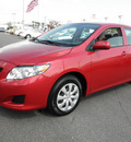 toyota corolla 2009 red sedan le 4 cylinders automatic 34788