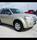 mercury mariner 2011 gold suv i4 gasoline 4 cylinders front wheel drive 6 speed automatic 77338