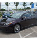 scion tc 2009 dk  red coupe gasoline 4 cylinders front wheel drive automatic 77566