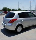 nissan versa 2011 silver hatchback 5dr hb i4 auto 1 8 s gasoline 4 cylinders front wheel drive automatic 76108