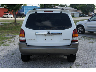 mazda tribute 2004 white suv es v6 gasoline 6 cylinders front wheel drive automatic 77531