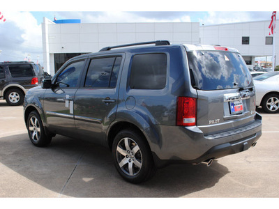 honda pilot 2012 dk  gray suv touring gasoline 6 cylinders 2 wheel drive automatic 77034