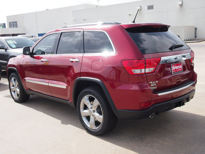 jeep grand cherokee 2012 red suv overland gasoline 8 cylinders 4 wheel drive automatic 77388