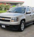 chevrolet suburban 2007 gold suv ls 1500 flex fuel 8 cylinders rear wheel drive automatic with overdrive 77074