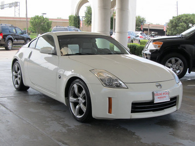 nissan 350z 2006 white coupe touring gasoline 6 cylinders rear wheel drive shiftable automatic 77477