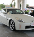nissan 350z 2006 white coupe touring gasoline 6 cylinders rear wheel drive shiftable automatic 77477