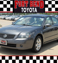 nissan altima 2005 gray sedan 2 5 s gasoline 4 cylinders front wheel drive automatic with overdrive 77469