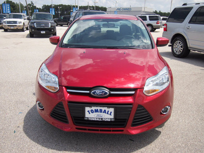 ford focus 2012 red candy tinted sedan se flex fuel 4 cylinders front wheel drive automatic 77375