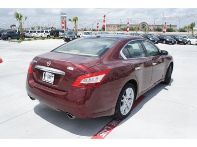 nissan maxima 2011 dk  red sedan 3 5 sv gasoline 6 cylinders front wheel drive automatic 78520