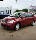 nissan versa 2010 dk  red sedan 1 8 s gasoline 4 cylinders front wheel drive automatic with overdrive 76116