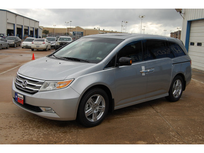 honda odyssey 2012 silver van touring gasoline 6 cylinders front wheel drive automatic with overdrive 77034