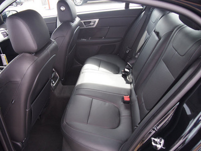 jaguar xf 2012 black sedan gasoline 8 cylinders rear wheel drive automatic 77090