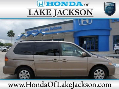 honda odyssey 2004 gold van ex gasoline 6 cylinders front wheel drive automatic 77566