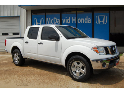 nissan frontier 2007 white se gasoline 6 cylinders rear wheel drive automatic with overdrive 77034