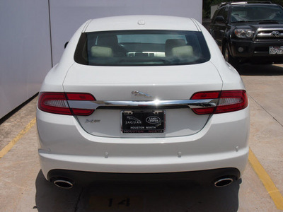 jaguar xf 2012 white sedan gasoline 8 cylinders rear wheel drive automatic 77090