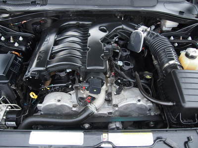 dodge charger 2009 black sedan sxt gasoline 6 cylinders rear wheel drive 4 speed automatic 77521