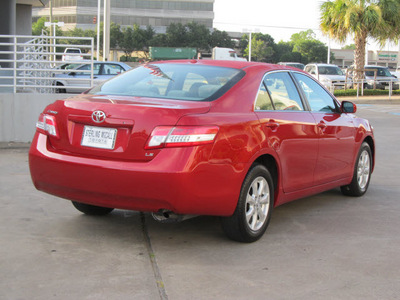 toyota camry 2011 red sedan le gasoline 4 cylinders front wheel drive automatic with overdrive 77074