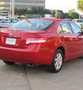 toyota camry 2011 red sedan le gasoline 4 cylinders front wheel drive automatic with overdrive 77074